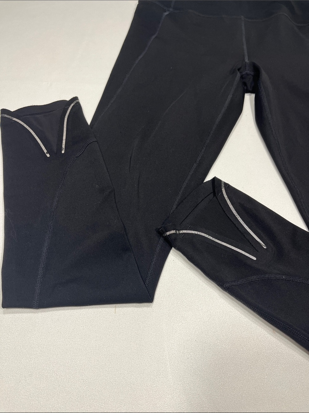 Athleta ST Black 7/8 Leggings Reflective Trim Zip Pocket Tall - Picture 4 of 8